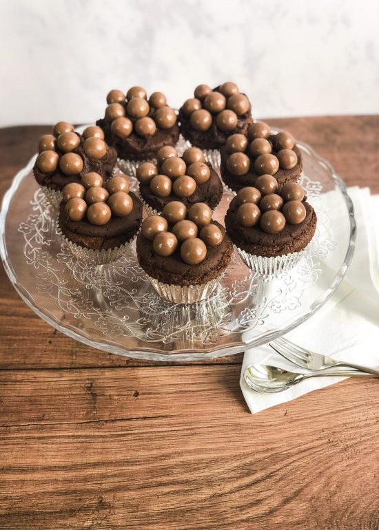 https://foodnerd4life.com/wp-content/uploads/2020/06/Overhead-Shot-of-Malteaser-Cupcakes-www.foodnerd4life.com_-scaled-e1589989907119.jpg